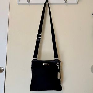 Tumi Nylon Black Crossbody Bag – Chic & Functional! 🖤